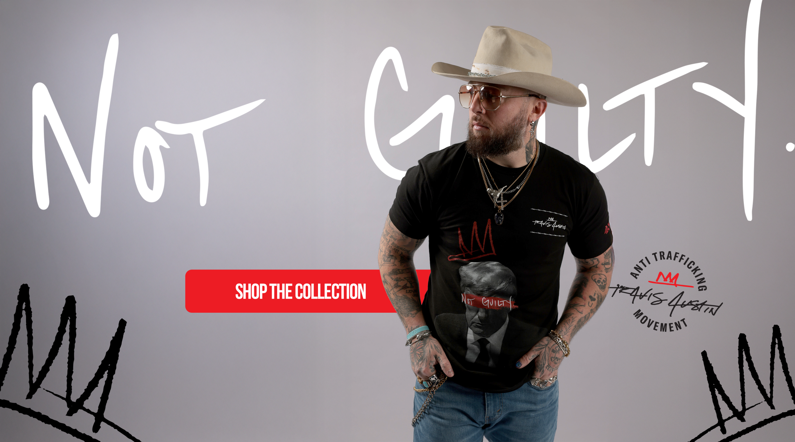 Travis Austin in cowboy hat wearing Not Guilty t-shirt - Outlaws Never Die wearable art
